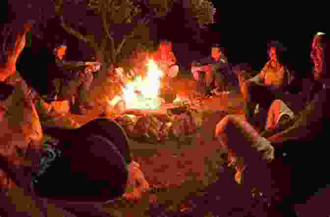 A Group Of People Gathered Around A Campfire, Engaged In Deep Conversation, Representing The Book's Exploration Of Human Nature. A Corner Of The World