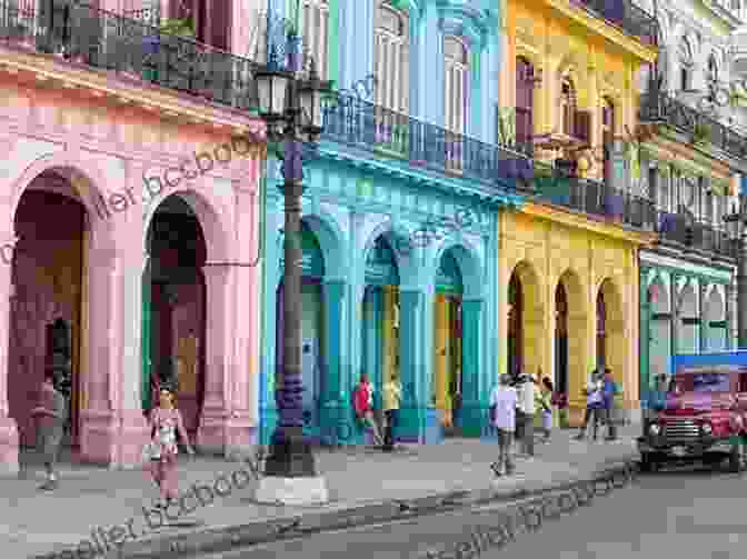 A Panoramic View Of The Vibrant City Of Havana, Cuba, Showcasing Its Colorful Architecture And Lively Streets. Island That Dared: Journeys In Cuba