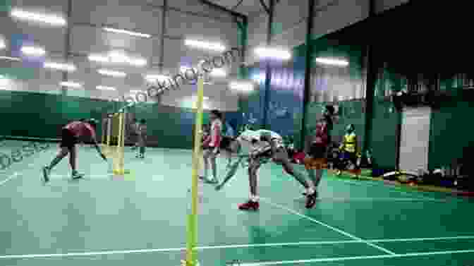 Badminton Players In Action On A Court HOW TO PLAY BADMINTON FOR BEGINNERS: Everything You Need To Know About Playing Badminton Tips Tricks And How To Be A Perfect Player