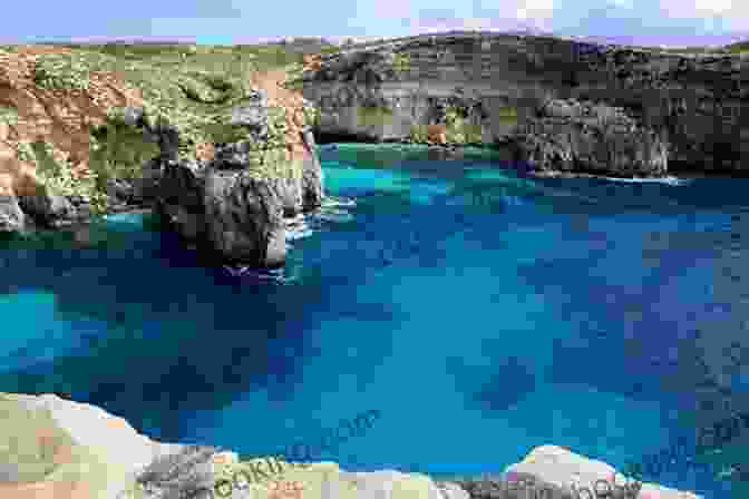Blue Lagoon On Comino Island, Malta, Showcasing Its Turquoise Waters, White Sandy Beach, And Dramatic Limestone Cliffs, Creating A Picturesque Paradise For Swimming, Snorkeling, And Sunbathing. DK Eyewitness Top 10 Malta And Gozo (Pocket Travel Guide)