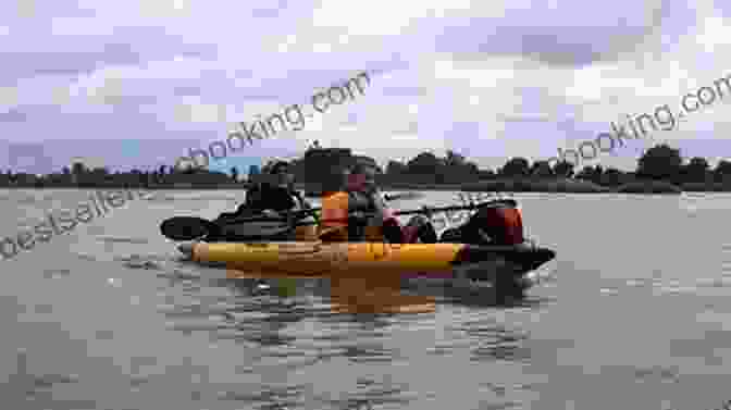 Kayaking On The Loire River, Surrounded By Lush Greenery DK Eyewitness Loire Valley (Travel Guide)